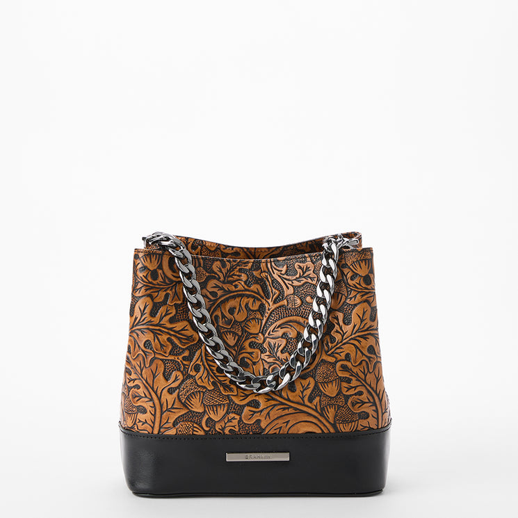 Brown patterned handbag with black accents on a white background. Mod Mini Amelia front view.