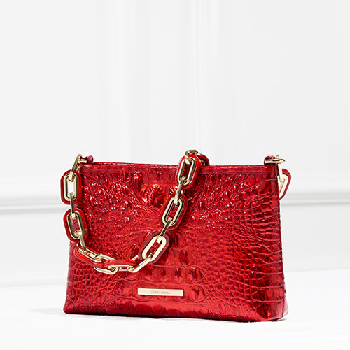 Brahmin Lorelei shoulder bag in glossy red croc-embossed leather, accented with oversized gold chain hardware and a compact rectangular frame for an elevated statement look.