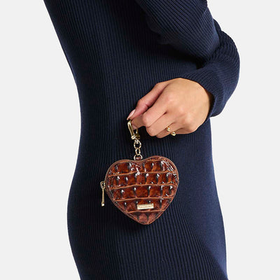 Pecan Melbourne Heart Pouch Being Held By Model