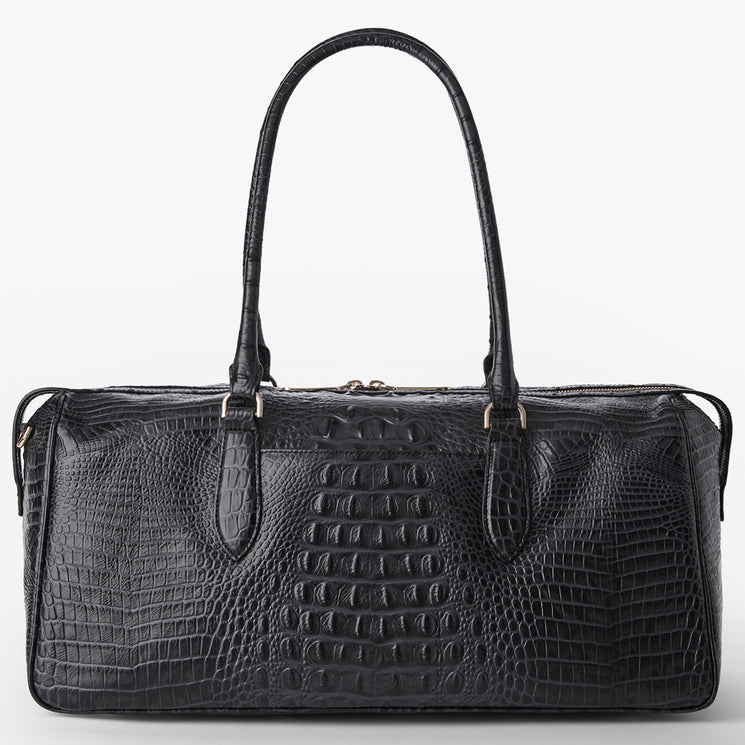 Brahmin black satchel handbag featuring a textured embossed pattern, two long shoulder straps, rectangular silhouette, and subtle gold-tone hardware, displayed on a plain white background.