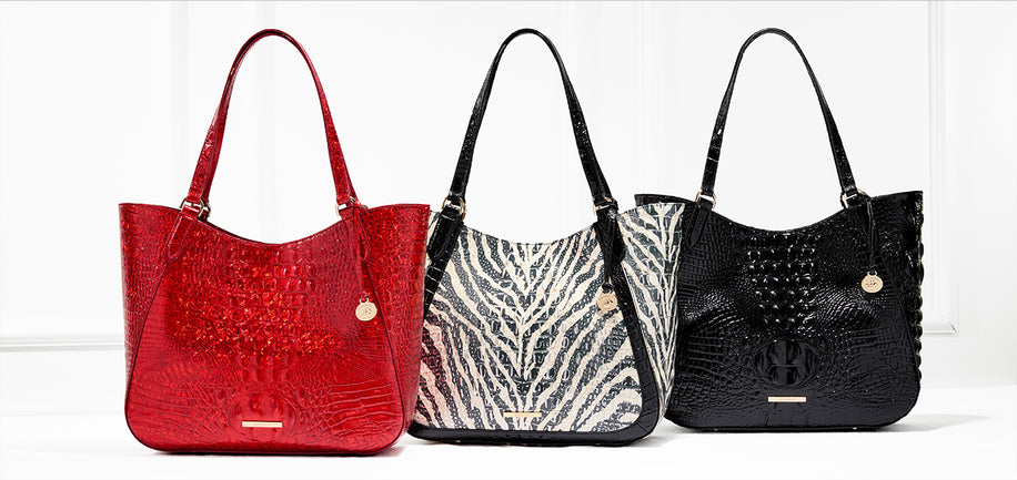 Three Aliza Tote Bags in red, black, and zebra pattern on a white background