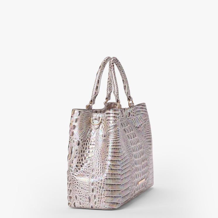 Brahmin iridescent tote bag with crocodile-embossed texture, double top handles, gold-tone hardware, and a structured silhouette shown against a white background.