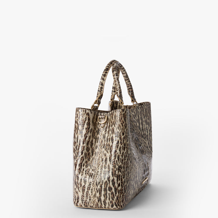 Leopard print tote bag on a white background. Denise side view.