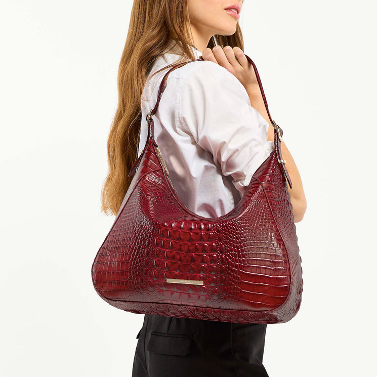 Model Holding Edie Scarlet Alden Road Handbag