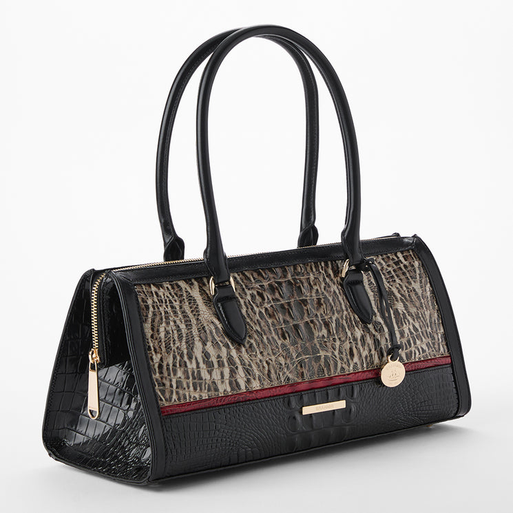 Brahmin handbag with leopard print and black and red leather accents on a white background. Sophia side view.