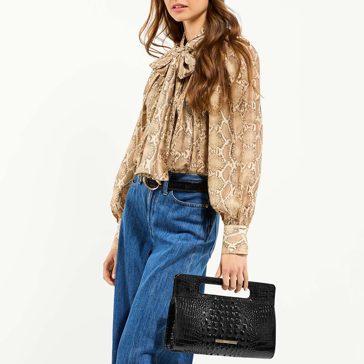 Model Holding Black Melbourne Ravina in Hand