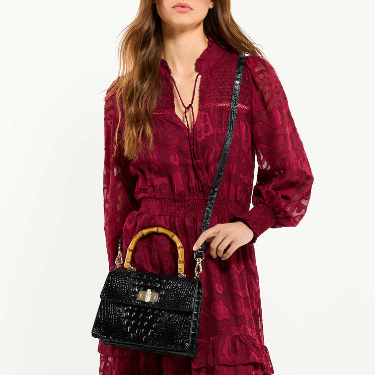Model Wearing Mod Small Hallie Black Melbourne as a crossbody bag