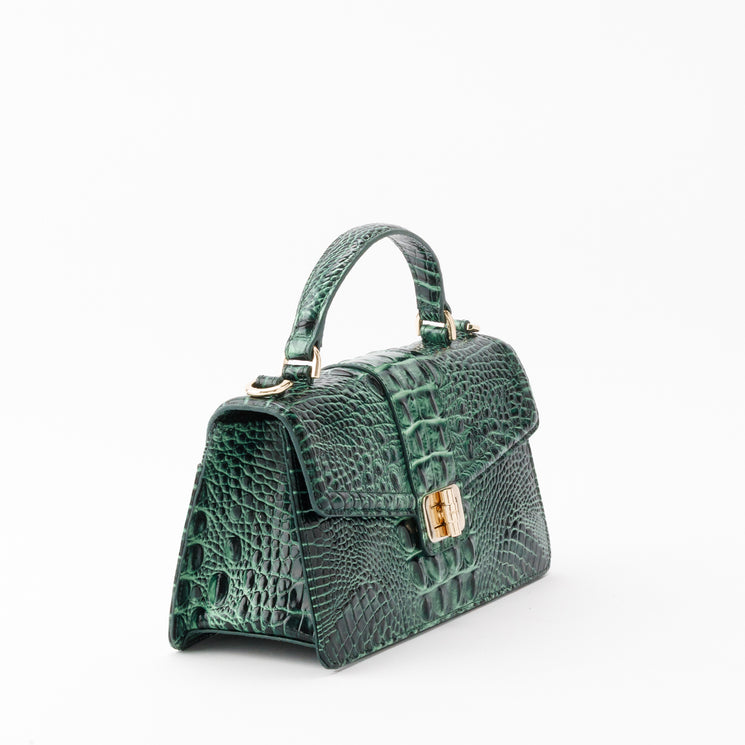 Green Brahmin Genie satchel with a croc-embossed texture, top handle, and gold hardware clasp.