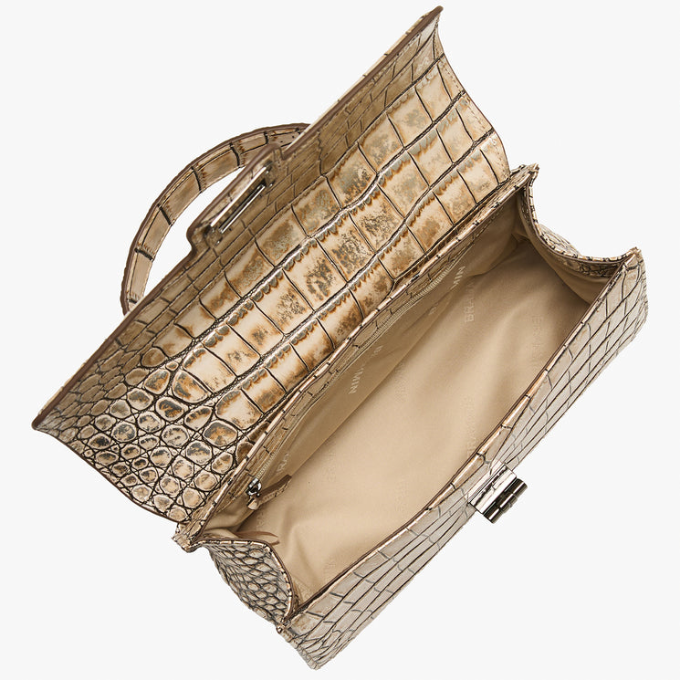 Beige crocodile-patterned handbag on a white background. Open top view.