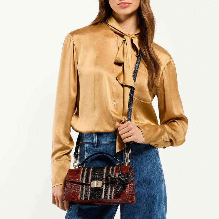 Model Wearing Genie Crossbody On a white background 
