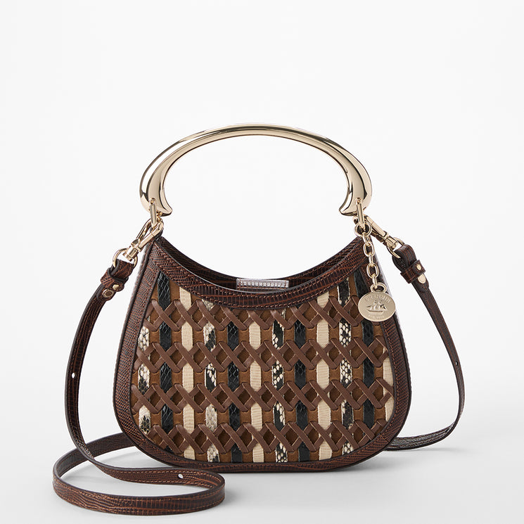 Patterned handbag with a gold handle on a white background. Brielle front view with strap.