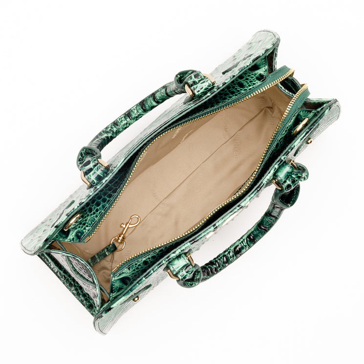 Open emerald green BRAHMIN Angelina satchel in a croc-embossed texture with gold-tone hardware, adjustable crossbody strap, and light beige interior.