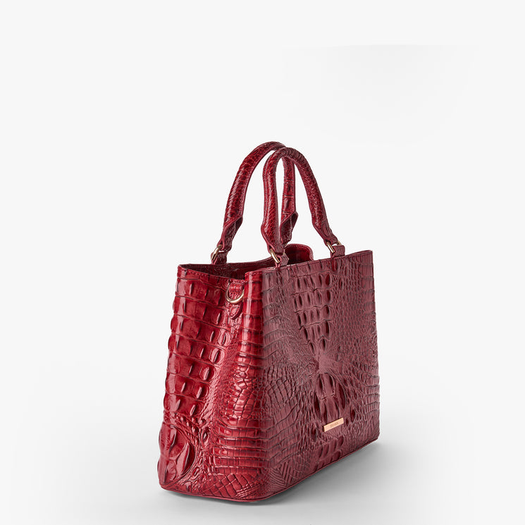 Volcanic Red Melbourne croc textured handbag on a light gray background. Small Denise side view.