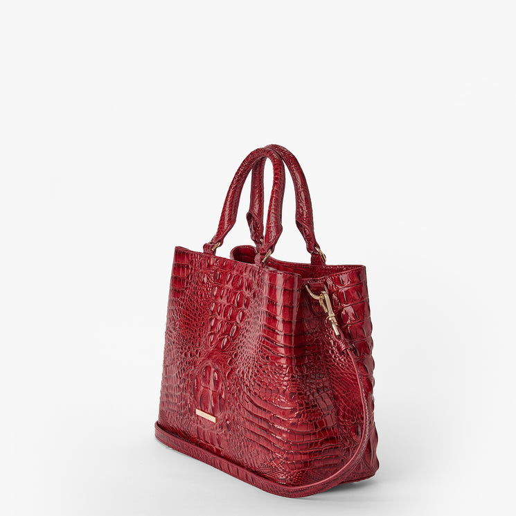 Volcanic Red Melbourne croc textured handbag on a light gray background. Small Denise side view.