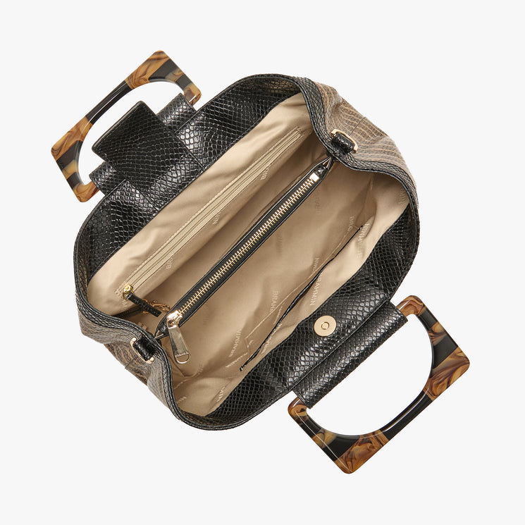 Small Denise handbag with wavy pattern and tortoiseshell handle on a white background. Open view.