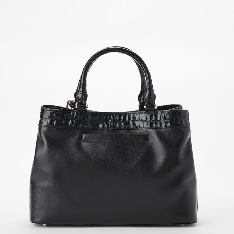 Brahmin black handbag with two top handles, rectangular silhouette, embossed textured trim along the top edge, smooth finish body, and gold-tone hardware, shown on a plain white background.