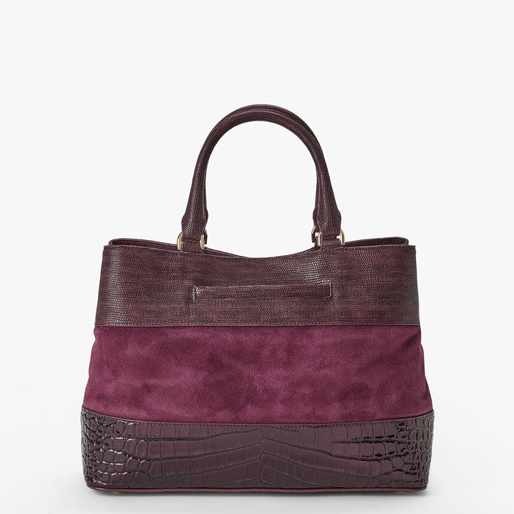 A structured handbag in deep burgundy, featuring a textured faux-crocodile pattern on the base, handles, and top trim, with a central suede panel in a muted plum-purple color.