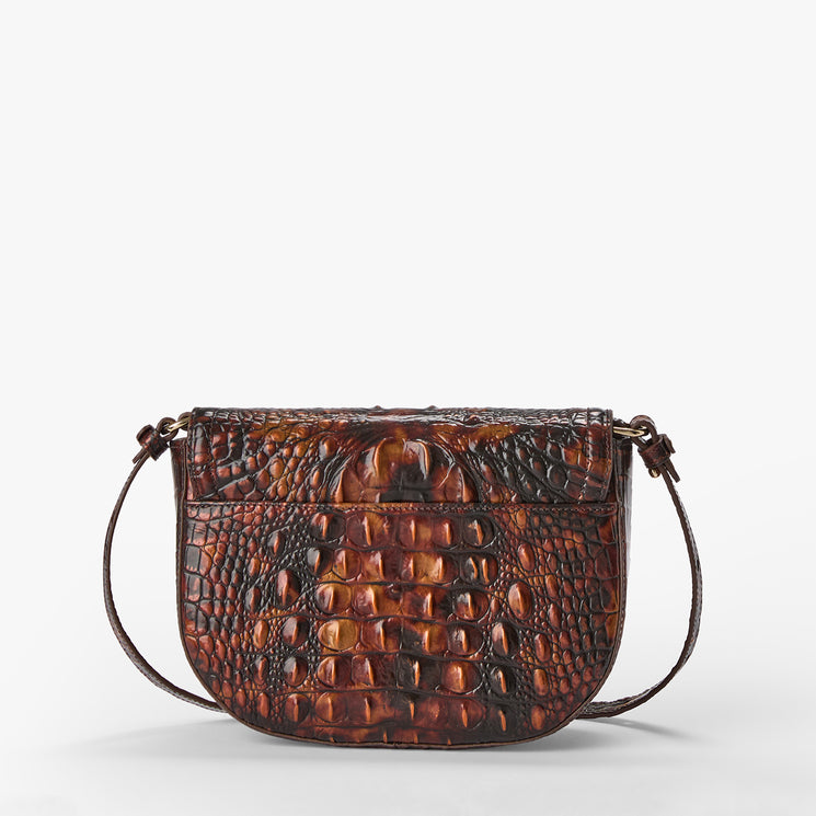 A brown crocodile-embossed leather shoulder bag with a dark brown adjustable strap, photographed against a clean white background.