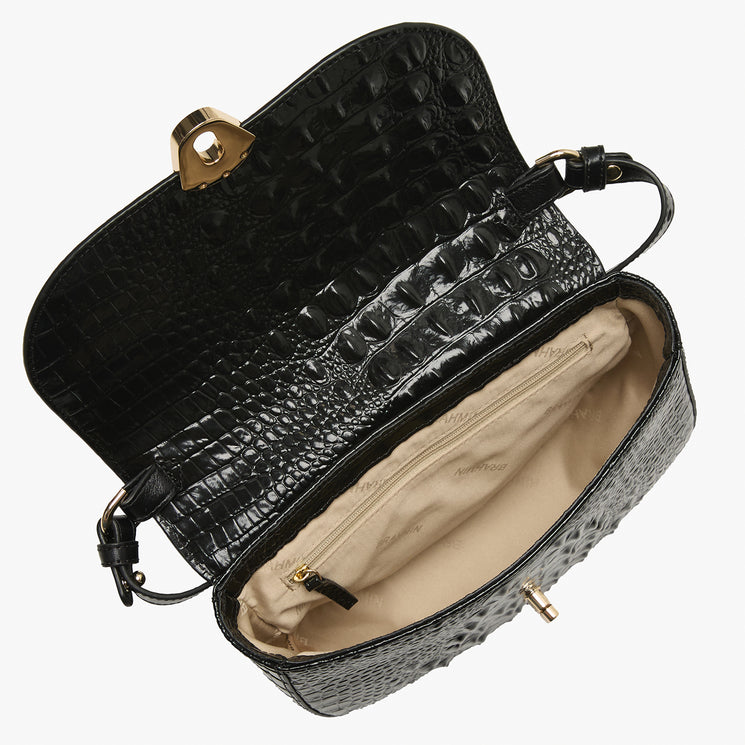 Brahmin handbag with leopard print and black and red leather accents on a white background. Portia open top view.