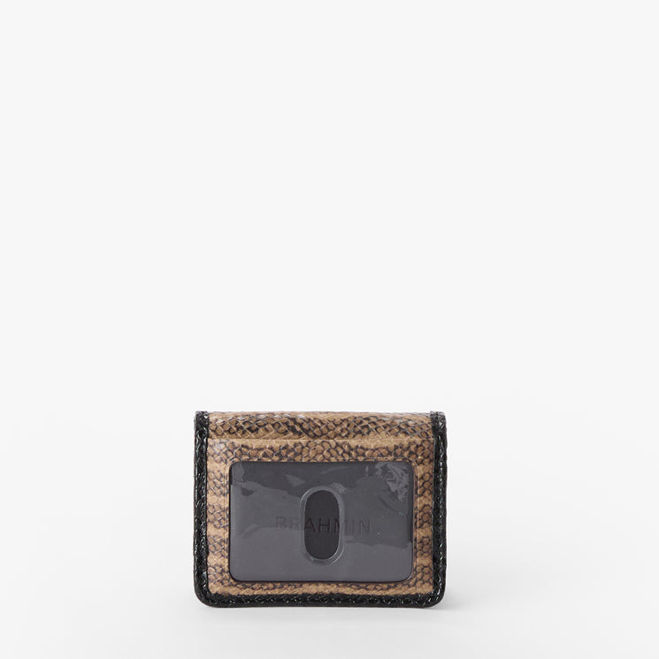 Small Clementine wallet with a Brahmin label on a white background. Back view.