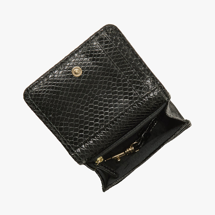 Small Clementine wallet with a Brahmin label on a white background. Open view.