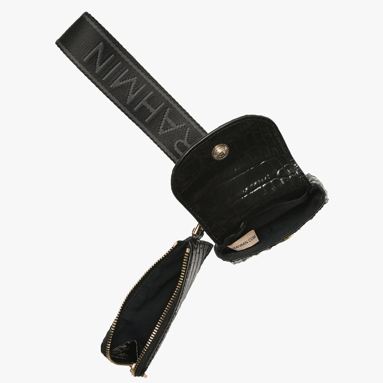 A black textured leather wristlet with a matching zippered pouch hanging from a gold-tone zipper, shown on a plain light gray background. Open view.