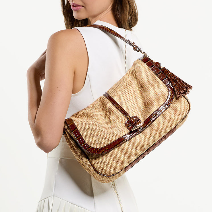 Woman carrying Jolene Shoulder bag on a white background