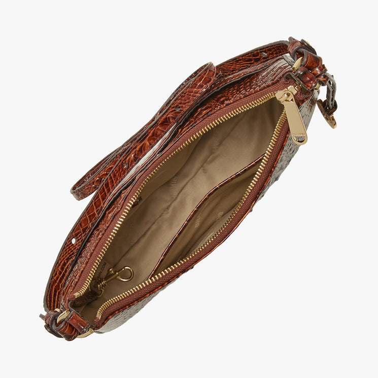 A brown crocodile-embossed leather crossbody bag shown open, displaying its tan interior lining and gold-tone hardware, set against a plain white background.
