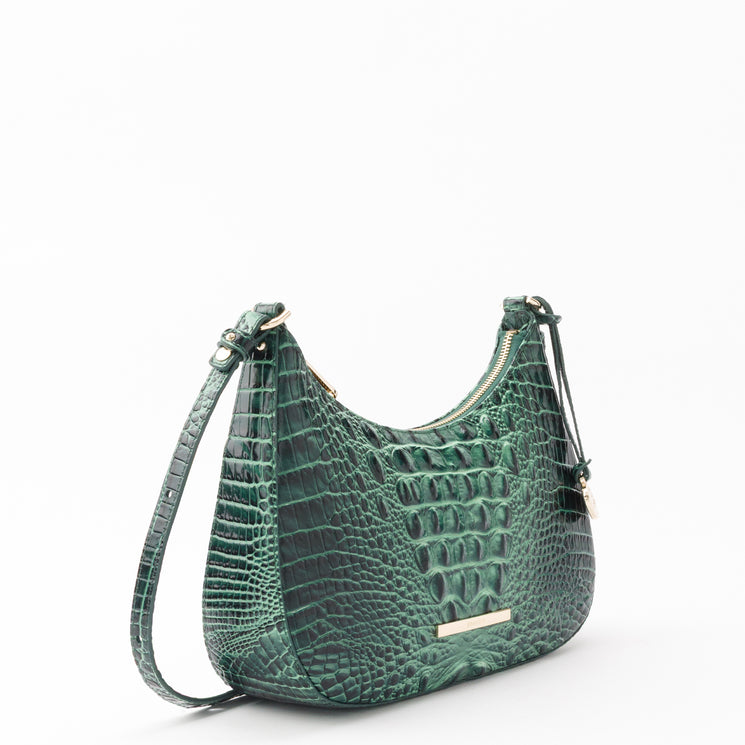 Small Stephie by BRAHMIN crescent-shaped handbag in forest green with an embossed texture, gold-tone hardware, and shoulder strap.