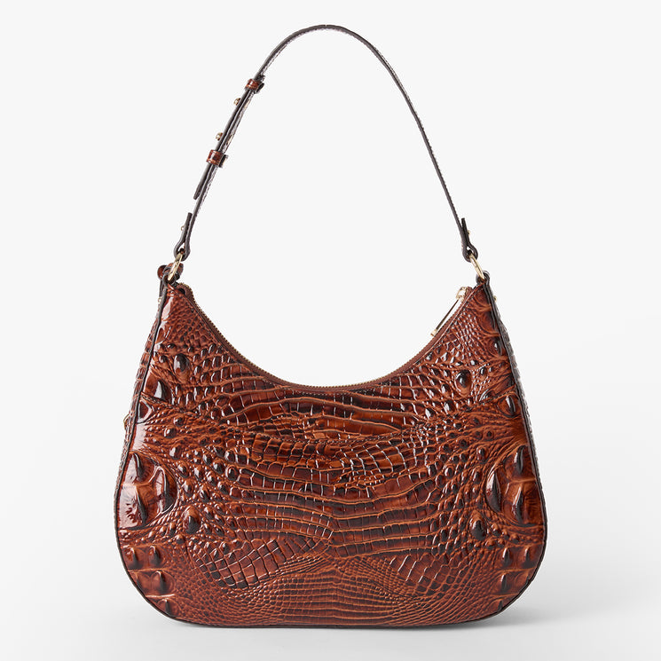 A brown crocodile-embossed leather shoulder bag with a curved hobo silhouette and a single shoulder strap, shown against a plain white background. Back view.
