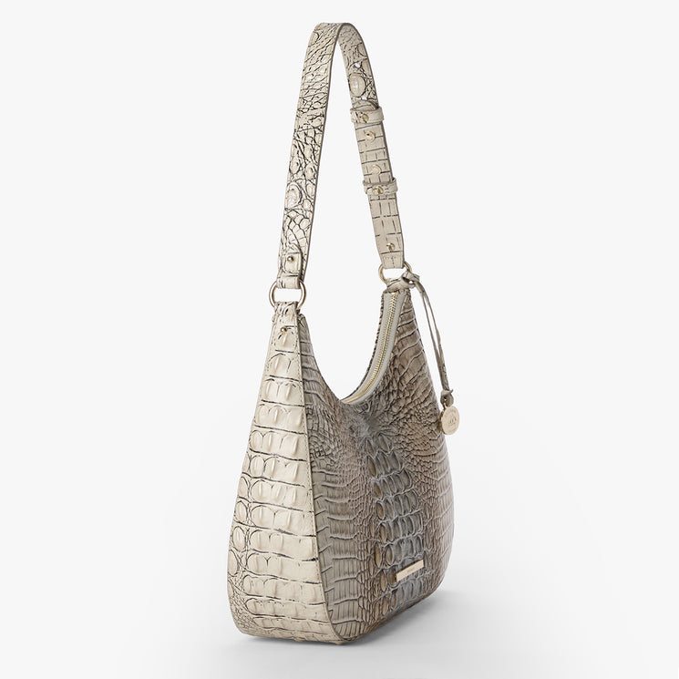 Silver crocodile-patterned Stephie handbag on a white background. Side view.