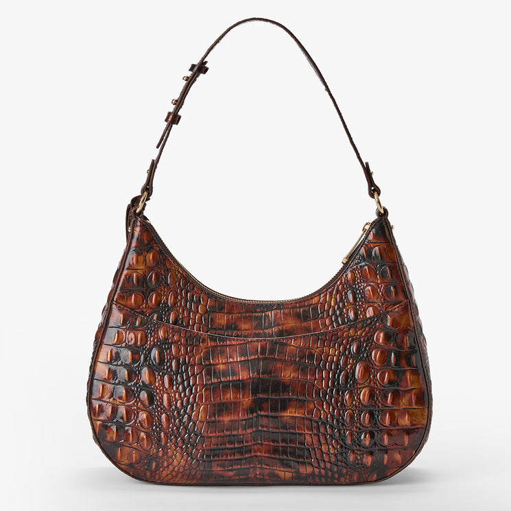 Brahmin brown shoulder bag with embossed textured pattern, curved silhouette, top zipper closure, gold-tone hardware, and adjustable strap. Displayed on a plain white background for product detail view.