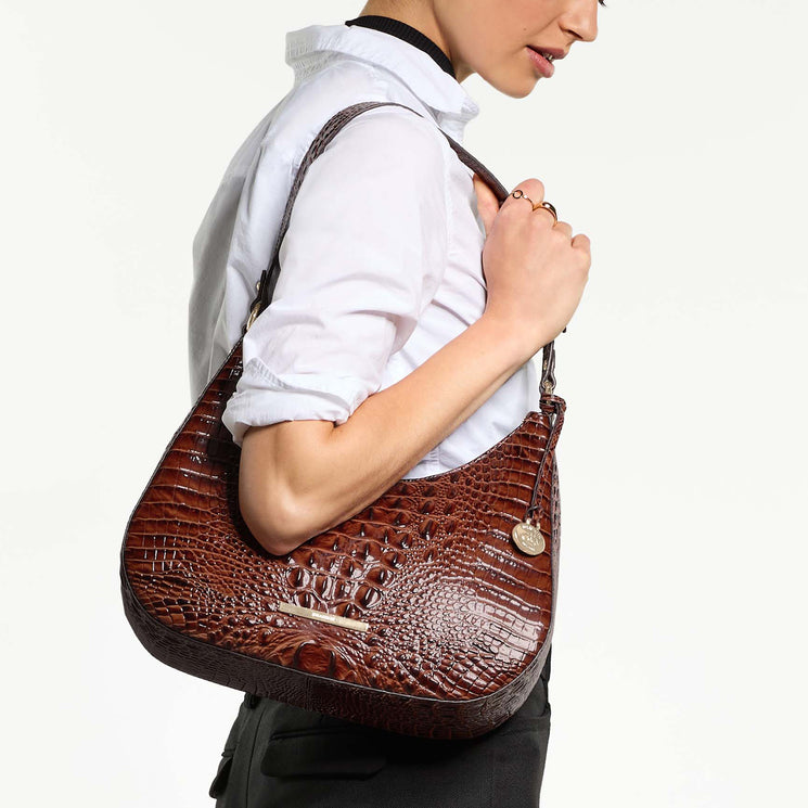 Person holding Stephie handbag against a white background