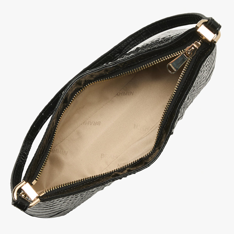Black crocodile-embossed leather handbag with gold-tone hardware, shown open to reveal a beige interior lined with the brand name BRAHMIN. Open view.