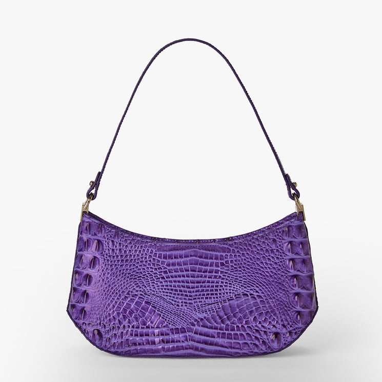 Brahmin purple handbag with embossed textured pattern, structured silhouette, short shoulder strap, and gold hardware, displayed upright on a white background. Strap allows for hand or shoulder wear.