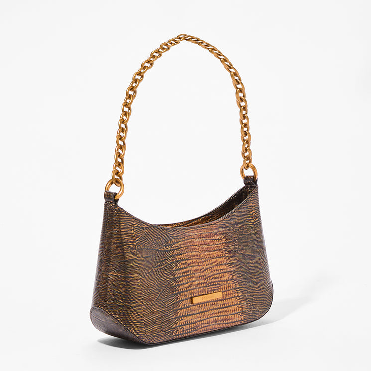 A metallic bronze hobo shoulder bag with a textured crocodile skin pattern, featuring a gold-tone chain strap and a small gold brand plaque on the front.