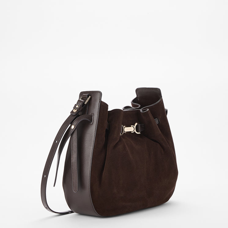 A dark brown suede and leather shoulder bag with a gold-tone metal clasp, shown on a clean white background.