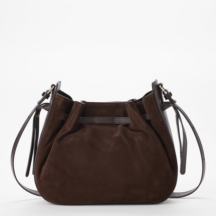 A dark brown suede slouchy shoulder bag with a matching dark brown leather strap and a thin horizontal leather accent band across the middle, shown against a plain white background.