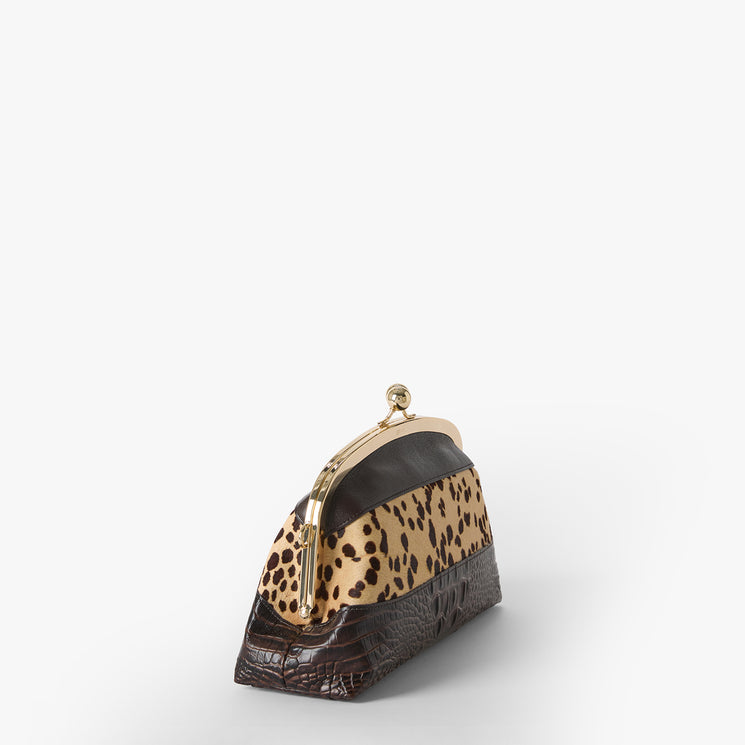 Christine Clutch bag with leopard print top section and brown textured bottom section on a white background. Side view.