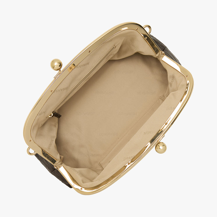 Christine Clutch bag with leopard print top section and brown textured bottom section on a white background. Open top view.