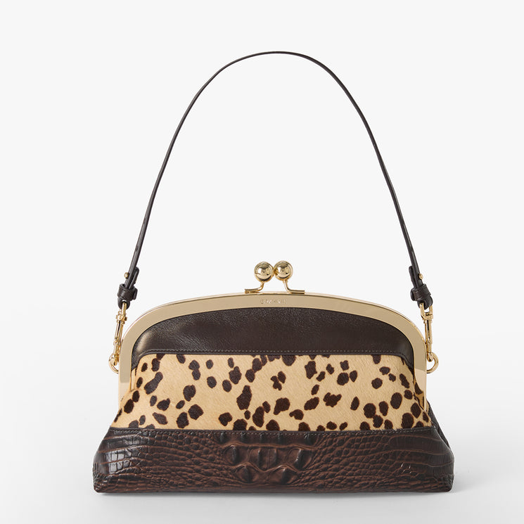 Christine Clutch bag with leopard print top section and brown textured bottom section on a white background. Front view with strap.