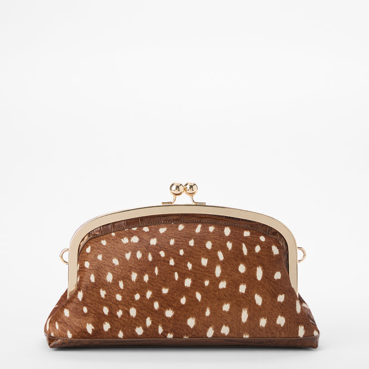 Brahmin brown clutch bag with white spots, structured silhouette, gold-tone metal frame and clasp, and smooth texture. The bag is displayed on a plain white background.