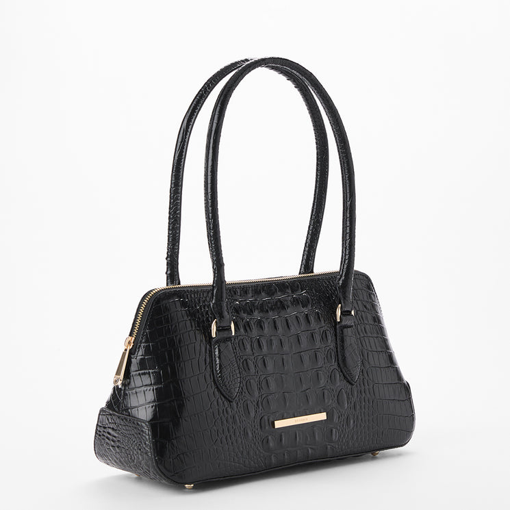 Black crocodile-embossed leather handbag with dual top handles, gold-tone hardware, and a zip-around closure, shown on a clean white background. Side view.