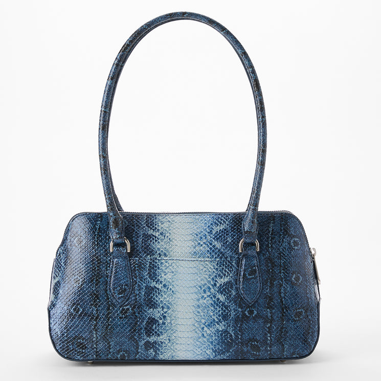 Jennifer blue snakeskin pattern handbag on a white background. Back view.