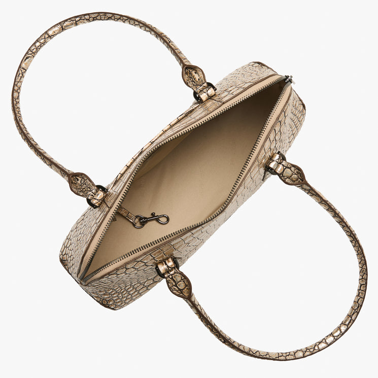Jennifer designer handbag with intricate pattern on a white background. Open top view.