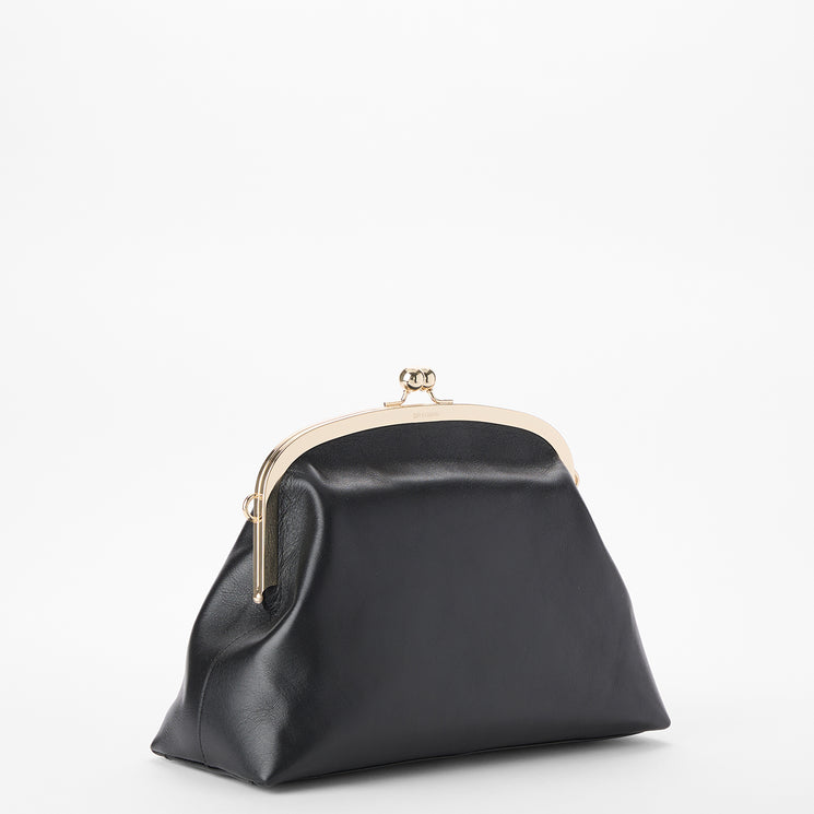 Brahmin black clutch purse with a structured silhouette, gold-tone metal frame and clasp, smooth leather exterior, no visible strap, shown on a plain white background.