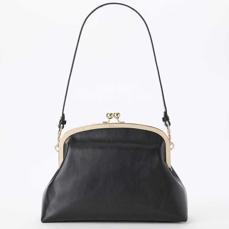 Brahmin black structured handbag with vintage-inspired gold metal frame, single black shoulder strap, smooth texture, classic silhouette, gold clasp hardware; displayed on a plain white background.