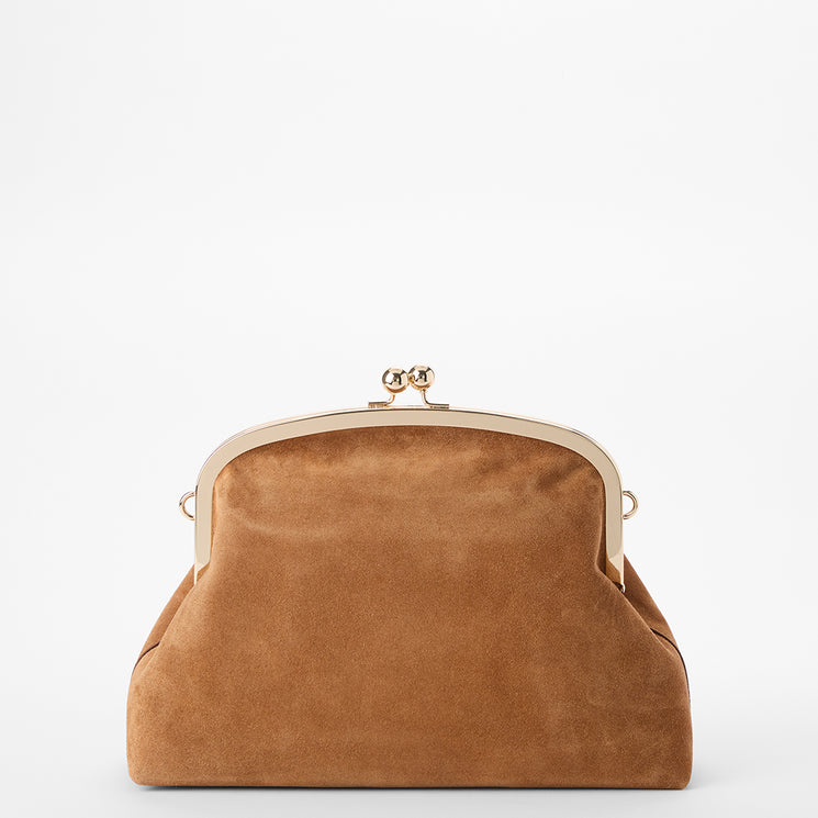 A tan suede kiss-lock clutch bag with a gold-tone metal frame and clasp, photographed against a clean white background.