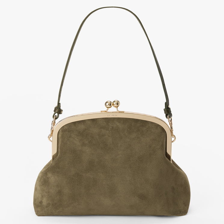 An olive green suede kiss-lock handbag with a gold-tone metal frame and a thin dark shoulder strap, shown against a plain white background.