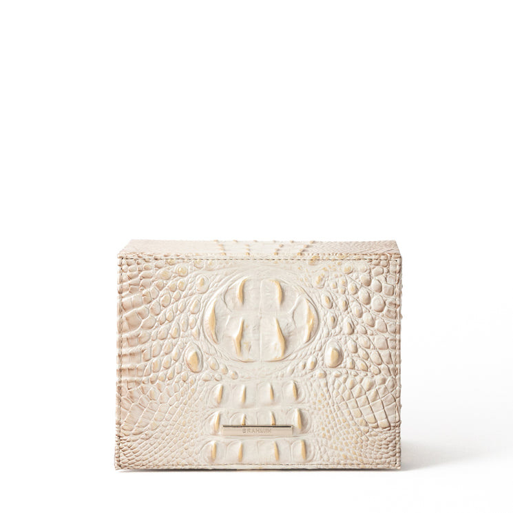 BRAHMIN Small Box cream bag with croc-embossed texture, rectangular shape, metallic Brahmin logo label, and structured silhouette. Shown upright against a white background. No visible strap or interior details.